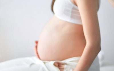 parental-massage A photo of a pregnant woman's belly