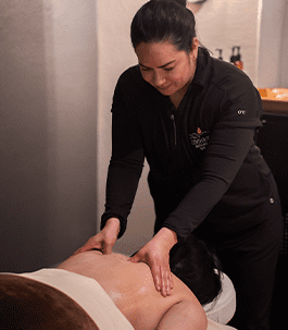 Deep tissue massage A man receiving a deep tissue massage by a therapist