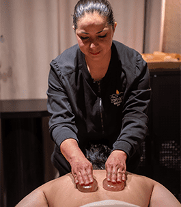 Hot stone massage Hot Stone Massage Denver at Zen'd Out Massage Spa